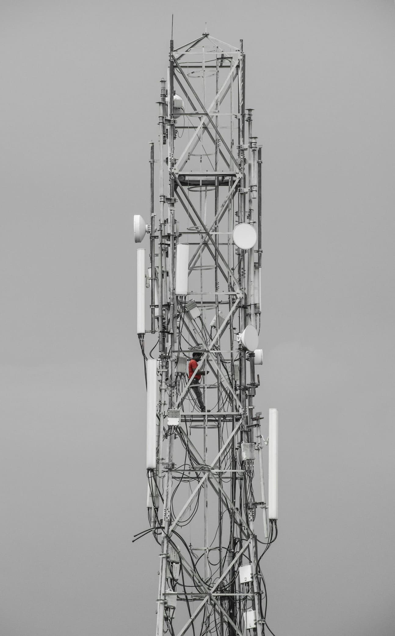 Telecommunications tower with cellular and network antennas
